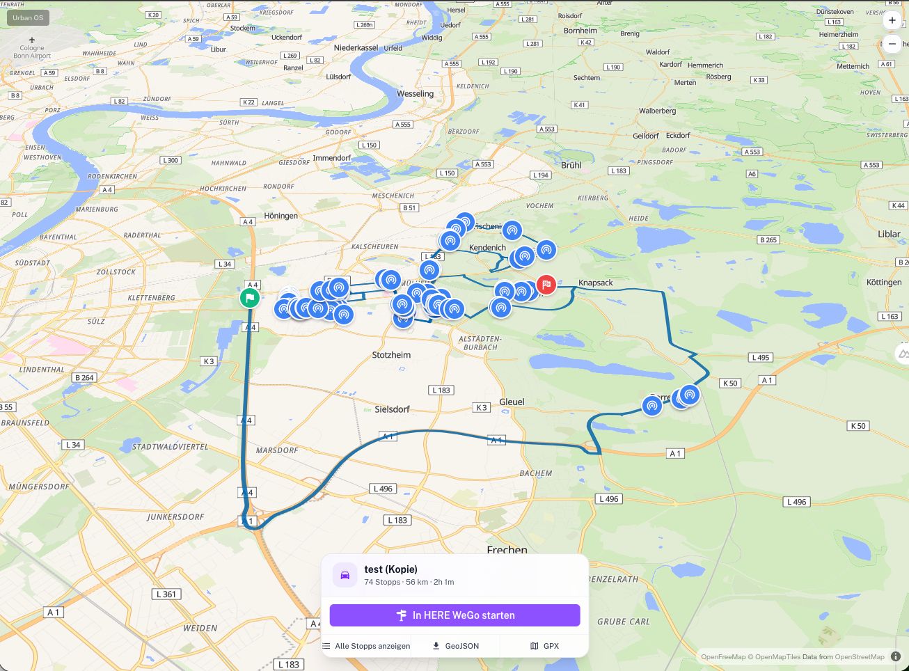 Screenshot: map view with a planned 74-stop tour, HERE WeGo handoff and GeoJSON and GPX export
